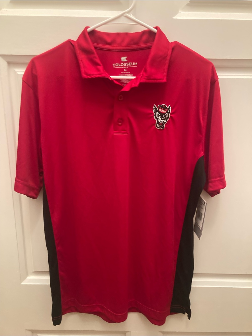 Colosseum Men’s NC State Red Polo with Black Side Panels and Embroidered Mascot
